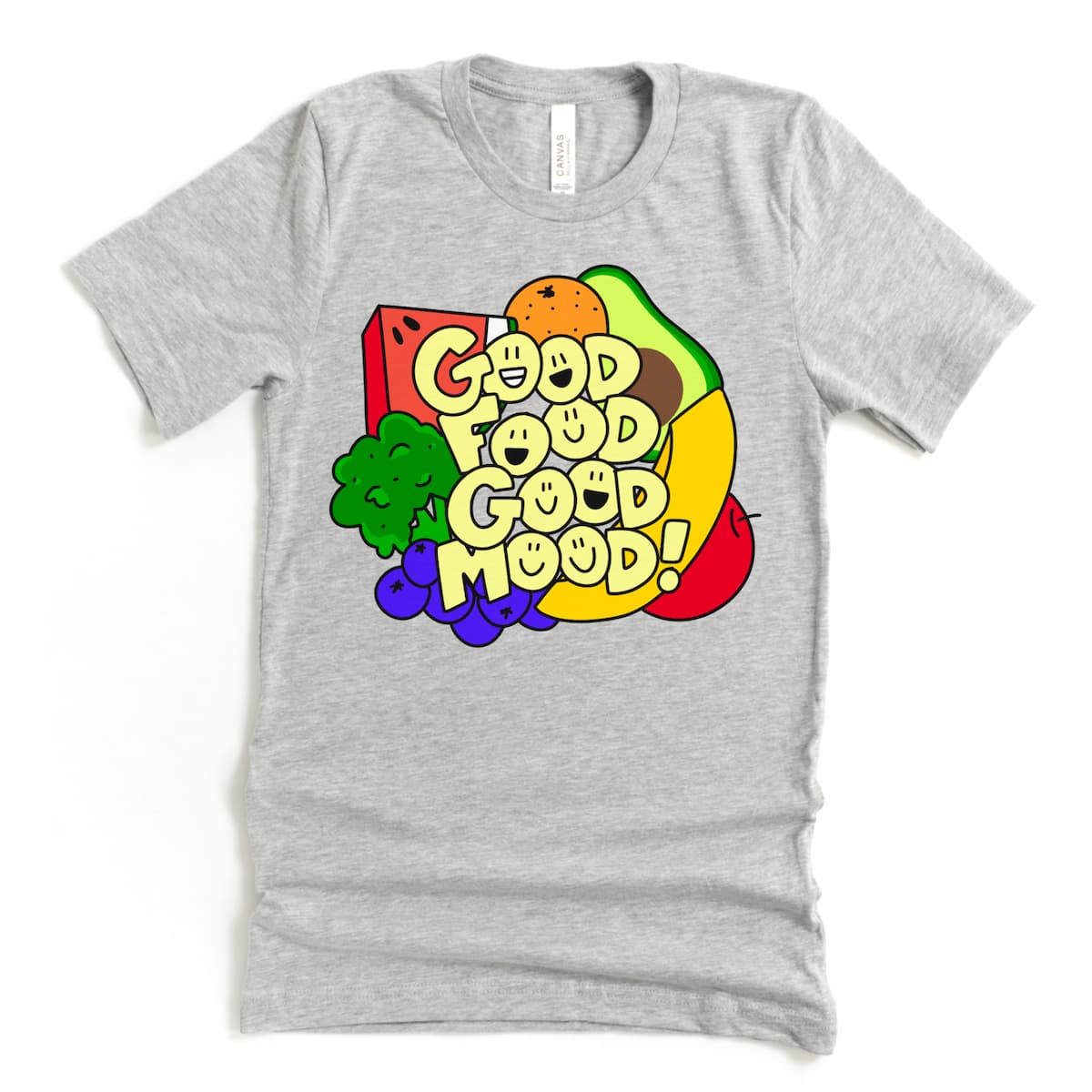 Flat lay of a heather dark grey Good Food Good Mood T Shirt with bold, colorful produce design and smiley text, by Kalirally